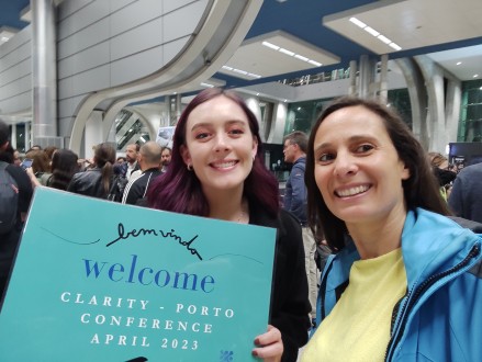 Aoife and Lara holding a welcome sign