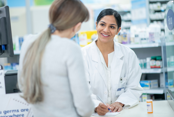 Pharmacist talking with a patient